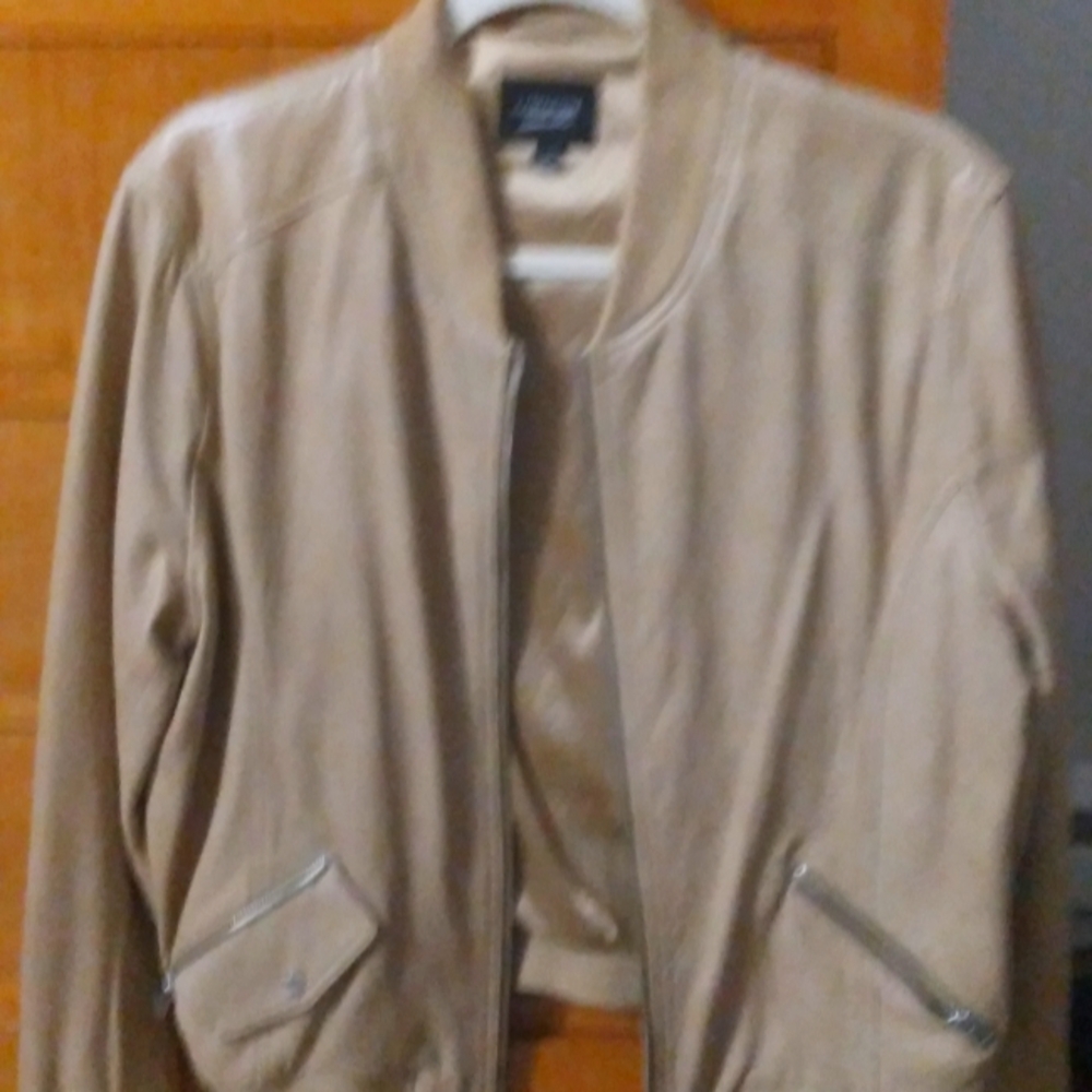 Neiman Marcus LaMarque leather( lamb) jacket.New, never worn.